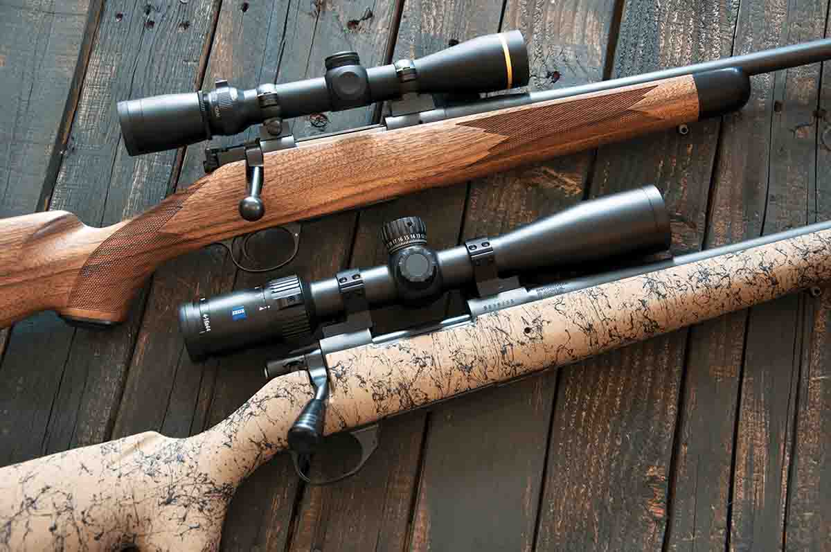 The Kimber Classic .243 Winchester (top) features a 22-inch barrel, forend tip, traditional walnut stock and a Leupold VX-3 2.5-8x 36mm scope. The Howa 1500 6mm Creedmoor (below) has a 26-inch barrel, HS Precision stock and a Zeiss Conquest V4 4-16x 44mm scope.
